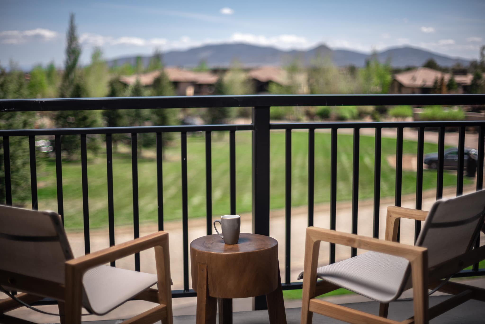 Balcony with view of golf course and hotel