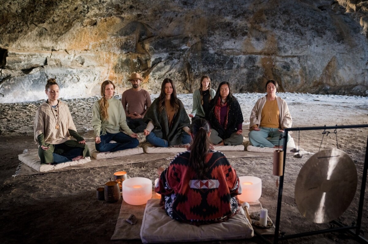 A group at a sound healing session during one of the top wellness retreats in Oregon.